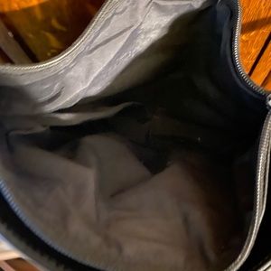Selling a leather used black Tignanello shoulder bag.